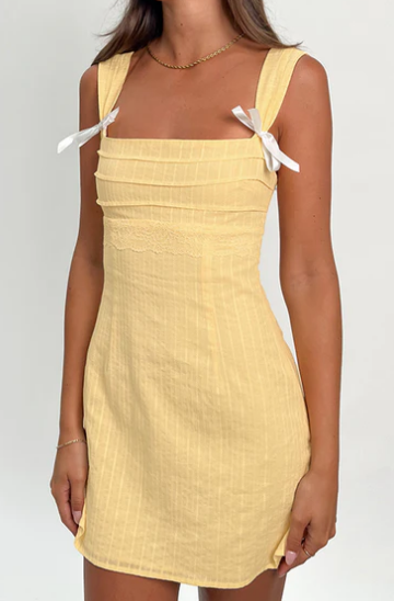 The Ultimate Guide to Rocking the Taylor Yellow Tie Back Mini Dress